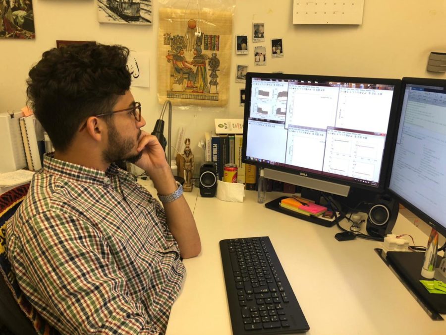 Osama Desouky, a graduate student at TAMU-Q, working at his office. Photo by Ayah Awrtani.
