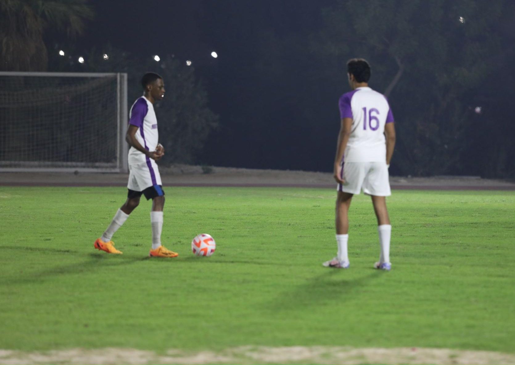 NU-Q players warming up before the later called-off opener against QU. (Photo/ Anudit Basnet)